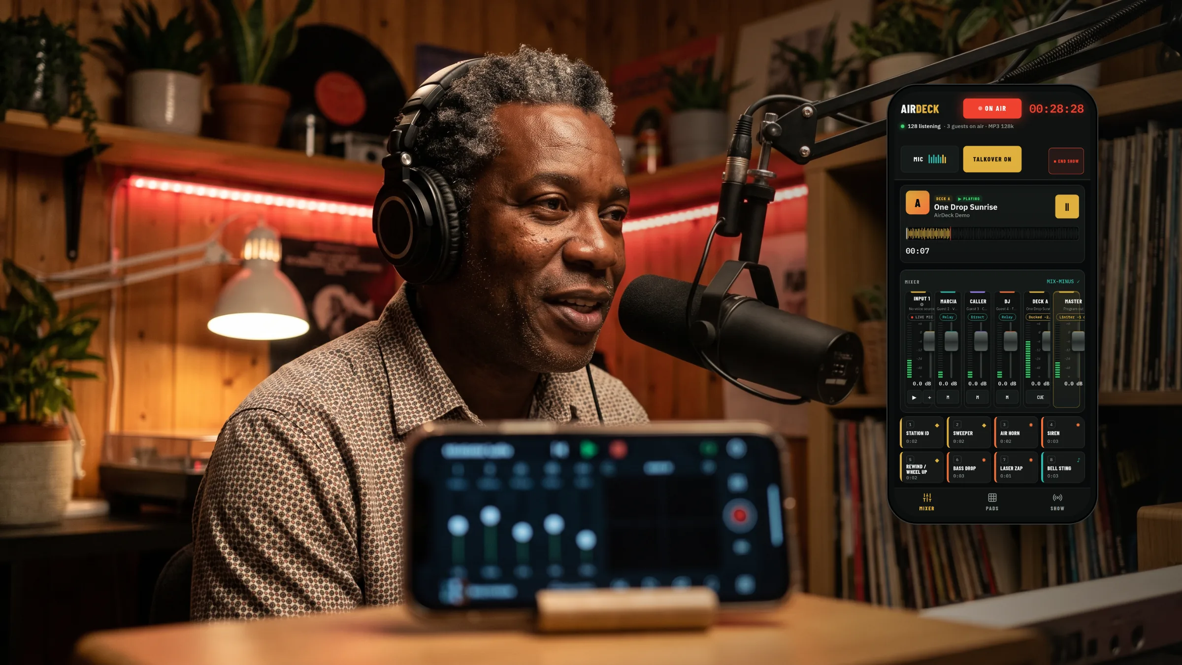 DJ broadcasting from his home studio with the AirDeck app shown on a phone